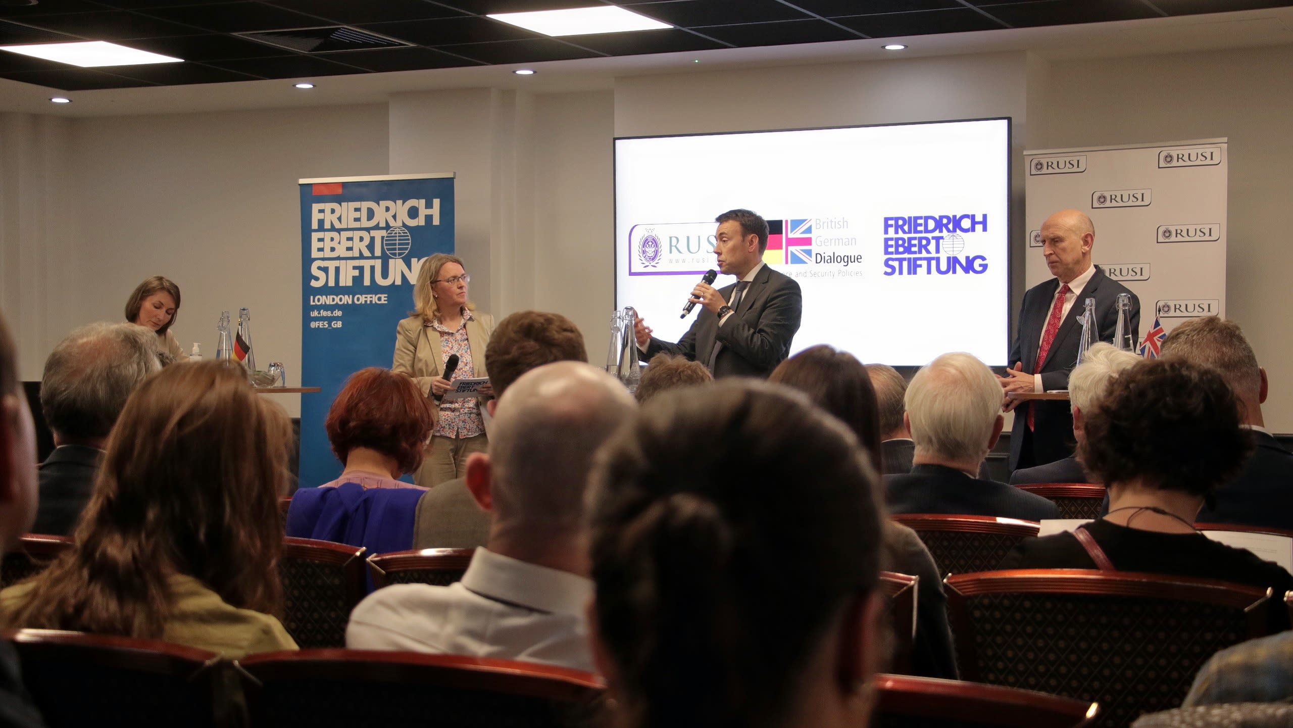 John Healey MP, Nils Schmid MdB and Michèle Auga, Director of Friedrich-Ebert-Stiftung London discuss UK–German defence and security cooperation.